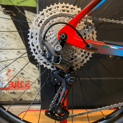 Bicicleta Oggi Agile Sport Carbon Aro 29 Deore 12v 2023 Azul e Vermelho