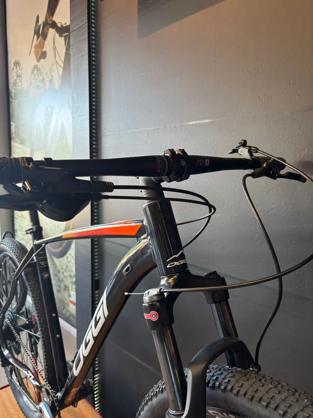 Bicicleta a29 oggi big wheel 7.0 2026 shimano cues 10v preto/laranja/cinza
