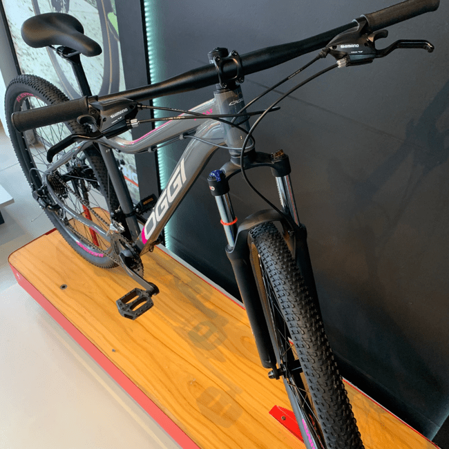 Bicicleta Oggi Float Sport Aro 29 Tourney 21v Grafite e Cinza e Rosa