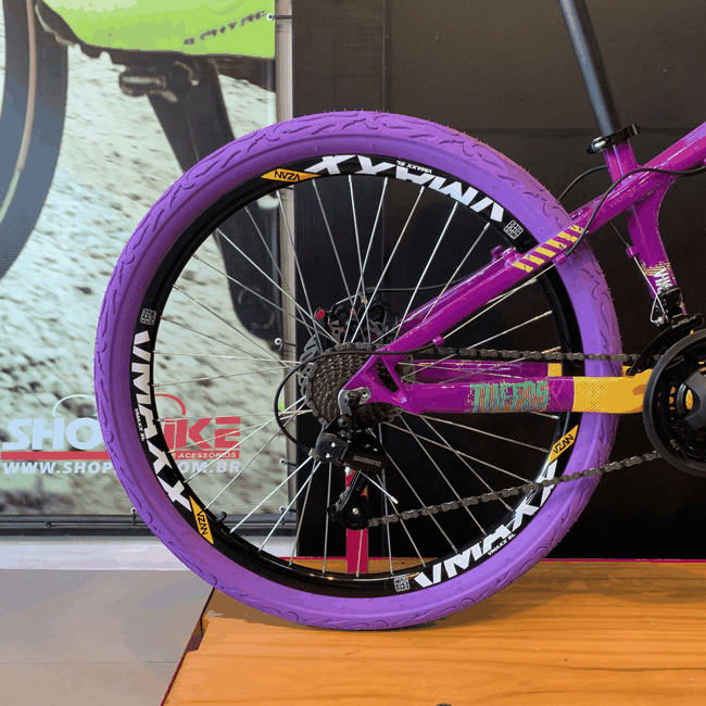 Bicicleta Vikingx Tuff 25 Shimano 21v com Roda Roxa e Guidão Roxo Aro 26 Roxa e Branca e Amarela e Verde