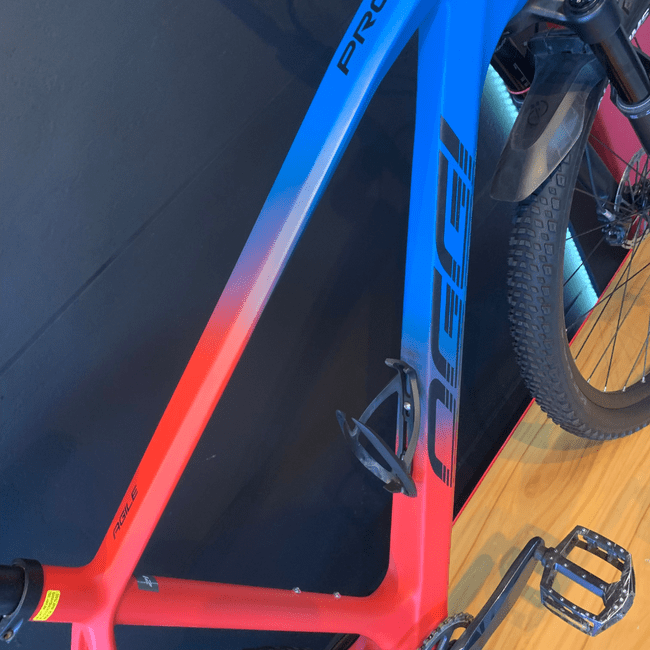 Bicicleta Oggi Agile Pro Aro 29 GX 12v Vermelho e Azul - Seminova