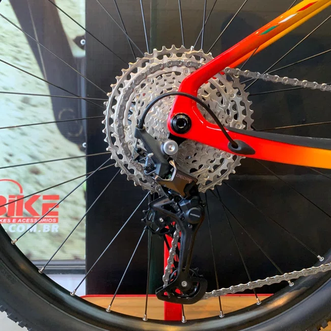 Bicicleta Oggi Agile Sport Aro 29 Deore 12v Azul Amarelo Vermelho