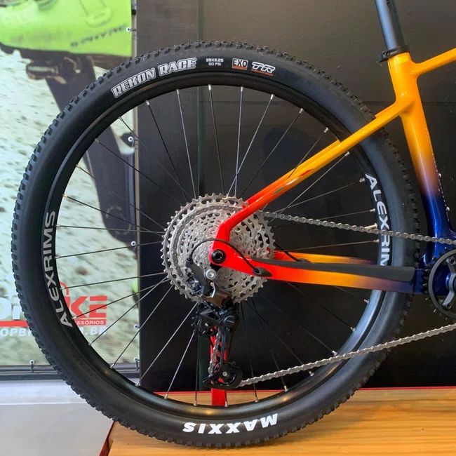 Bicicleta Oggi Agile Sport Aro 29 Deore 12v Azul Amarelo Vermelho