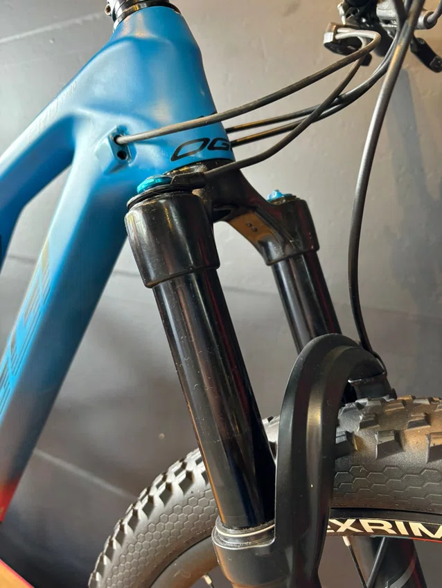 Bicicleta Oggi Cattura Pro T-17 Aro 29 GX 12V Vermelho e Azul - Seminova