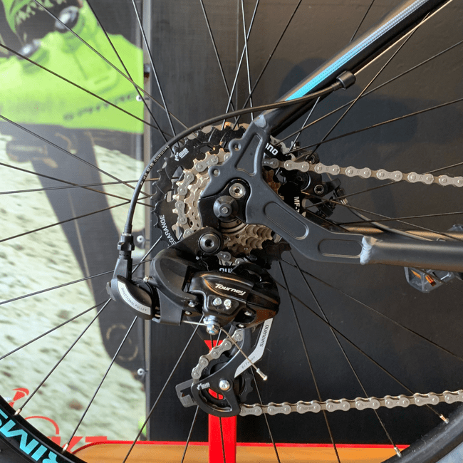 Bicicleta Oggi Float Sport Aro 29 Tourney 21v Preto e Azul e Rosa