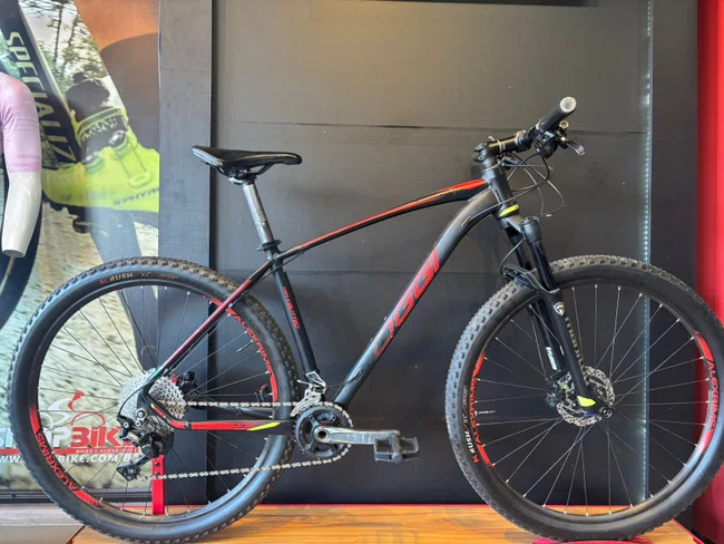 Bicicleta seminova a29 oggi bigwheel 7.3 shimano deore 20v preta/verde/vermelho