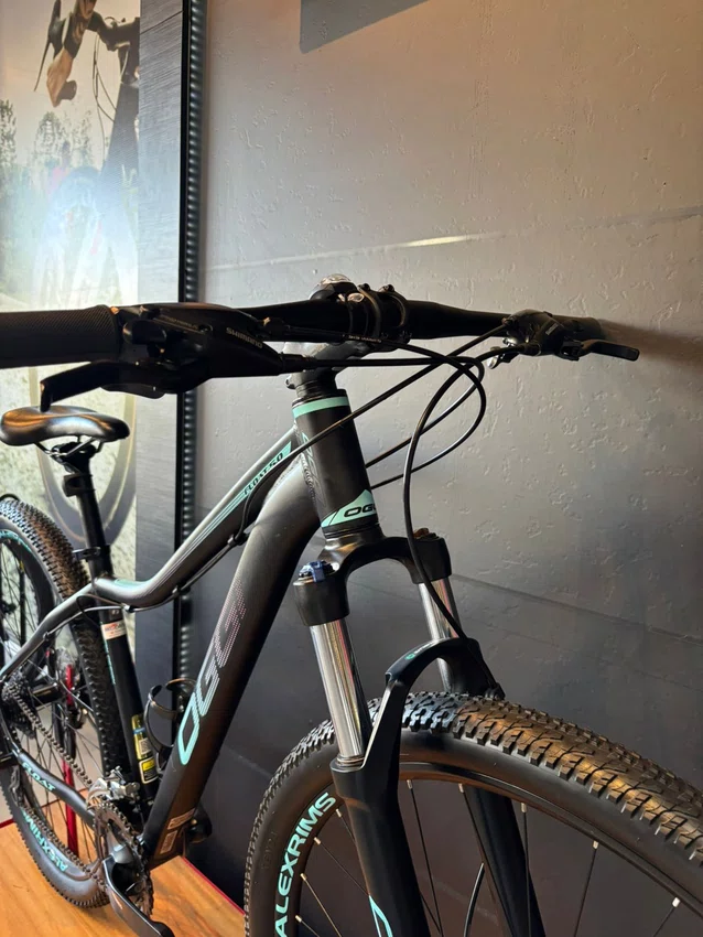 Bicicleta Seminova A29 Oggi Float 5.0 Shimano Tourney 24V t-17 Preto/Azul/Roxa