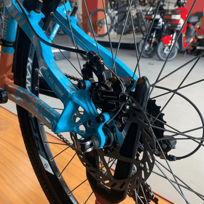 Bicicleta VikingX Tuff 25 Aro 26 Shimano Tourney 21V Azul e Laranja e Amarelo e Rosa - SemiNova