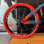 Bicicleta Vikingx Tuff X-35 Shimano 21V com Roda Laranja e Guidão Vermelho Aro 26 Azul Petróleo e Laranja